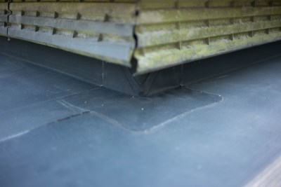 Install EPDM outside corners as necessary